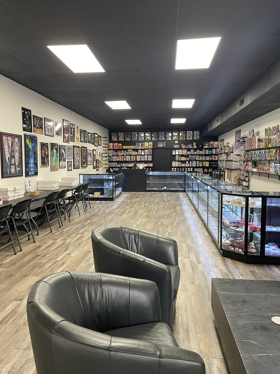 Another view inside of the shop including chairs